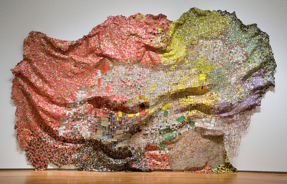 El Anatsui: Stressed World, 2011. Aluminum and copper wire; 174 x 234 inches. © El Anatsui; Courtesy of the artist and Jack Shainman Gallery, New York